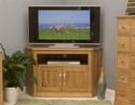 Mobel oak corner tv cabinet.
